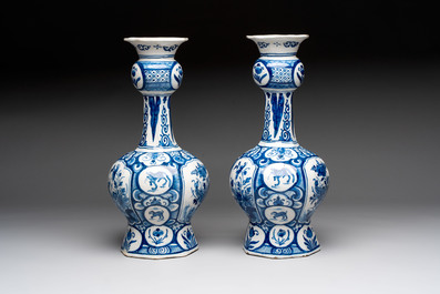 A pair of blue and white Dutch Delft vases with floral design, 18th C.