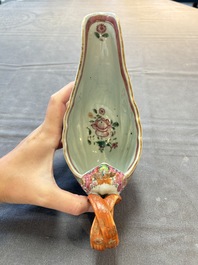 A pair of Chinese famille rose sauceboats and stands with floral design, Qianlong