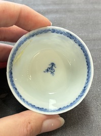 Ten Chinese blue and white cups and eleven saucers, Kangxi