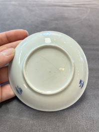 Ten Chinese blue and white cups and eleven saucers, Kangxi