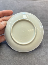 Ten Chinese blue and white cups and eleven saucers, Kangxi
