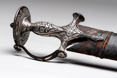 A fine Mughal silver-damascened tulwar with scabbard, India, 19th C.