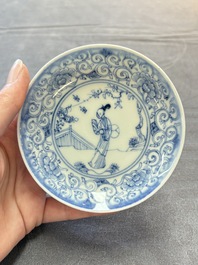 Ten Chinese blue and white cups and eleven saucers, Kangxi