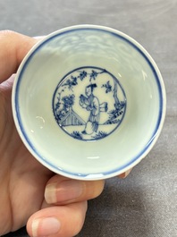 Ten Chinese blue and white cups and eleven saucers, Kangxi