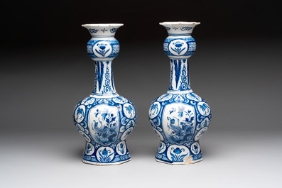 A pair of blue and white Dutch Delft vases with floral design, 18th C.