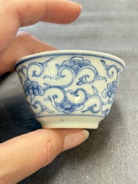 Ten Chinese blue and white cups and eleven saucers, Kangxi