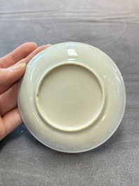 Ten Chinese blue and white cups and eleven saucers, Kangxi