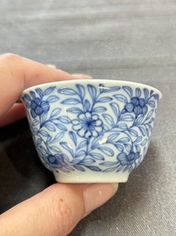 Ten Chinese blue and white cups and eleven saucers, Kangxi