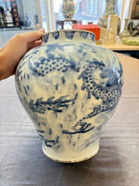 A Chinese blue and white 'dragon' vase, Transitional period