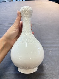 A Chinese white-glazed garlic-head vase and a robin&rsquo;s egg-glazed vase, Qianlong mark, 20th C.