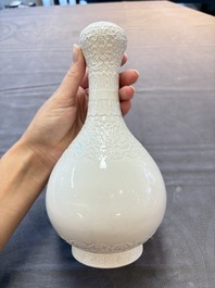 A Chinese white-glazed garlic-head vase and a robin&rsquo;s egg-glazed vase, Qianlong mark, 20th C.