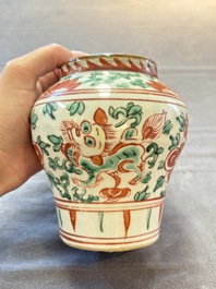 Five Chinese wucai 'Buddhist lion' and 'peony scroll' jars, Transitional period