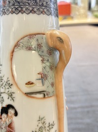 A Chinese famille rose vase with ladies in a garden, Qianlong mark, 19/20th C.