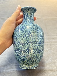 A Chinese white-glazed garlic-head vase and a robin&rsquo;s egg-glazed vase, Qianlong mark, 20th C.