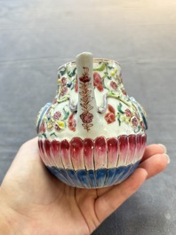 A group of five Chinese famille rose teapots and covers and three stands, Yongzheng/Qianlong