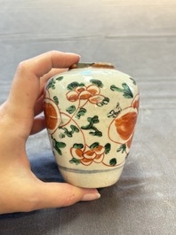 Five Chinese wucai 'Buddhist lion' and 'peony scroll' jars, Transitional period