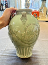 A Chinese Longquan celadon vase with floral design, Ming