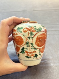 Five Chinese wucai 'Buddhist lion' and 'peony scroll' jars, Transitional period