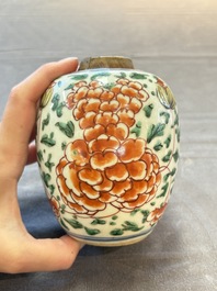 Five Chinese wucai 'Buddhist lion' and 'peony scroll' jars, Transitional period