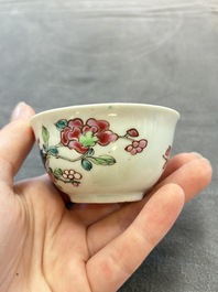 Eleven Chinese famille rose cups and nine saucers, Yongzheng/Qianlong