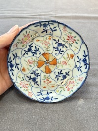 Eleven Chinese famille rose cups and nine saucers, Yongzheng/Qianlong