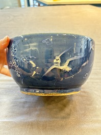 A rare Chinese Swatow white slip-decorated blue-ground bowl and cover, Ming