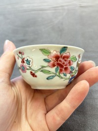 Eleven Chinese famille rose cups and nine saucers, Yongzheng/Qianlong