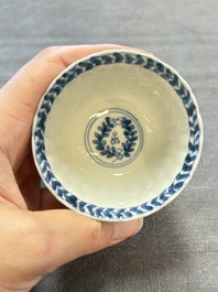 A set of six Chinese blue and white cups and saucers with floral design, Kangxi