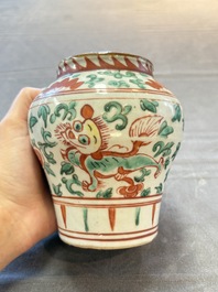 Five Chinese wucai 'Buddhist lion' and 'peony scroll' jars, Transitional period