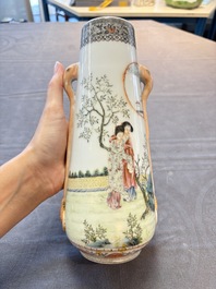 A Chinese famille rose vase with ladies in a garden, Qianlong mark, 19/20th C.