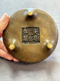 Two Chinese bronze tripod censers, Xuande marks, 19th C.
