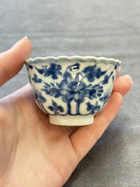 A set of six Chinese blue and white cups and saucers with floral design, Kangxi