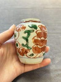 Five Chinese wucai 'Buddhist lion' and 'peony scroll' jars, Transitional period