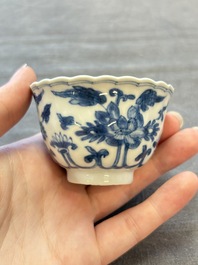 A set of six Chinese blue and white cups and saucers with floral design, Kangxi