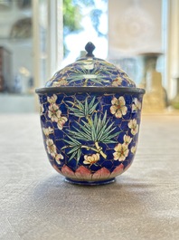 A pair of Chinese blue-ground Canton enamel covered bowls on stands and an egg cup, Qianlong/Jiaqing