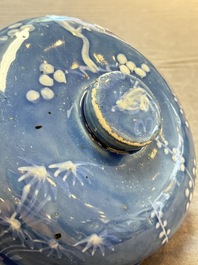 A rare Chinese Swatow white slip-decorated blue-ground bowl and cover, Ming