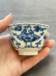 A set of six Chinese blue and white cups and saucers with floral design, Kangxi