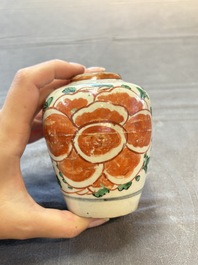 Five Chinese wucai 'Buddhist lion' and 'peony scroll' jars, Transitional period