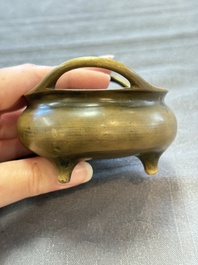 Two Chinese bronze tripod censers, Xuande marks, 19th C.