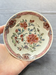 Eleven Chinese famille rose cups and nine saucers, Yongzheng/Qianlong