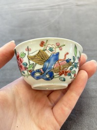 Eleven Chinese famille rose cups and nine saucers, Yongzheng/Qianlong