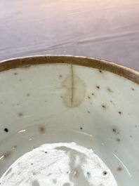 A rare Chinese Swatow white slip-decorated blue-ground bowl and cover, Ming