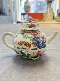 A group of five Chinese famille rose teapots and covers and three stands, Yongzheng/Qianlong