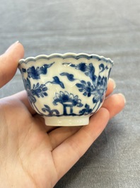 A set of six Chinese blue and white cups and saucers with floral design, Kangxi