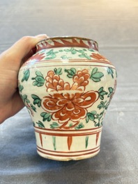 Five Chinese wucai 'Buddhist lion' and 'peony scroll' jars, Transitional period