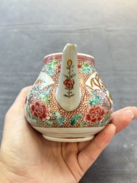 A group of five Chinese famille rose teapots and covers and three stands, Yongzheng/Qianlong