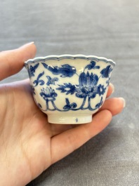 A set of six Chinese blue and white cups and saucers with floral design, Kangxi