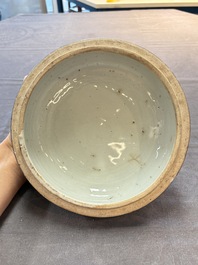 A rare Chinese Swatow white slip-decorated blue-ground bowl and cover, Ming