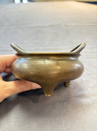 Two Chinese bronze tripod censers, Xuande marks, 19th C.