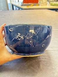 A rare Chinese Swatow white slip-decorated blue-ground bowl and cover, Ming